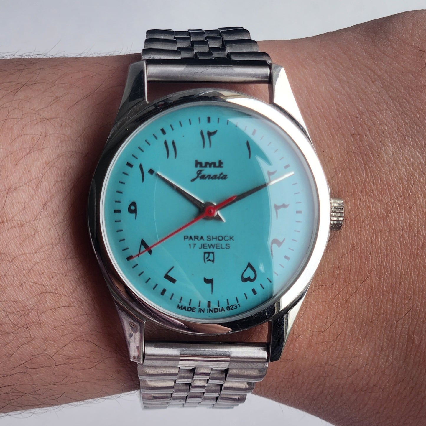 Vintage HMT Janata Urdu/Arabic Hand Winding 17 Jewels Sky Blue 35MM Silver Case Exhibition Back Men's Wrist Watch G58