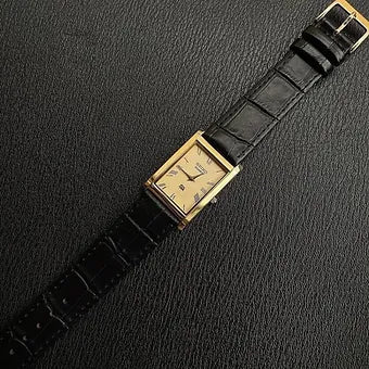 Seiko Slim Rectangular Quartz Golden Face Black Band Men's Wrist watch C54