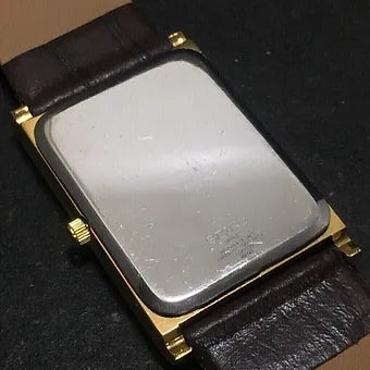 Seiko Slim Rectangular Quartz Golden Face Black Band Men's Wrist watch C54
