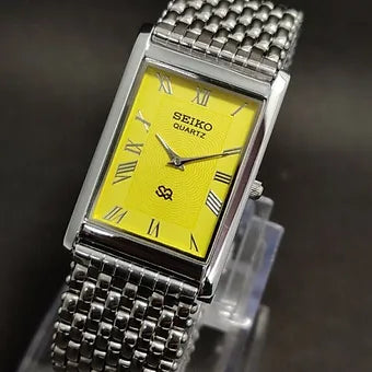 Seiko Slim Rectangular Quartz Yellow Face Looser Chain Not Adjustable Men's Wrist Watch C67
