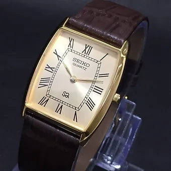 Vintage Seiko MOD Slim Barrel Quartz Golden Face Brown Band Men's Wrist Watch C95