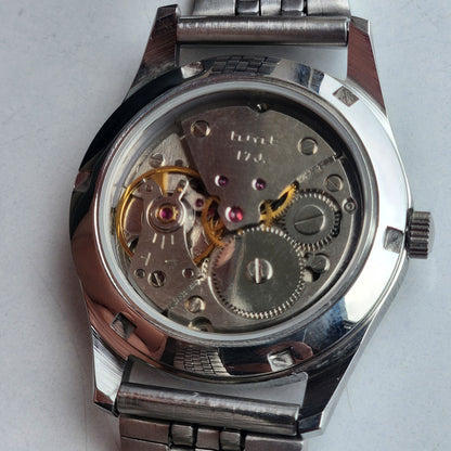 Vintage HMT Janata Devanagari Hand Winding 17 Jewels Red Face 35MM Silver Case Exhibition Back Men's Wrist Watch G48