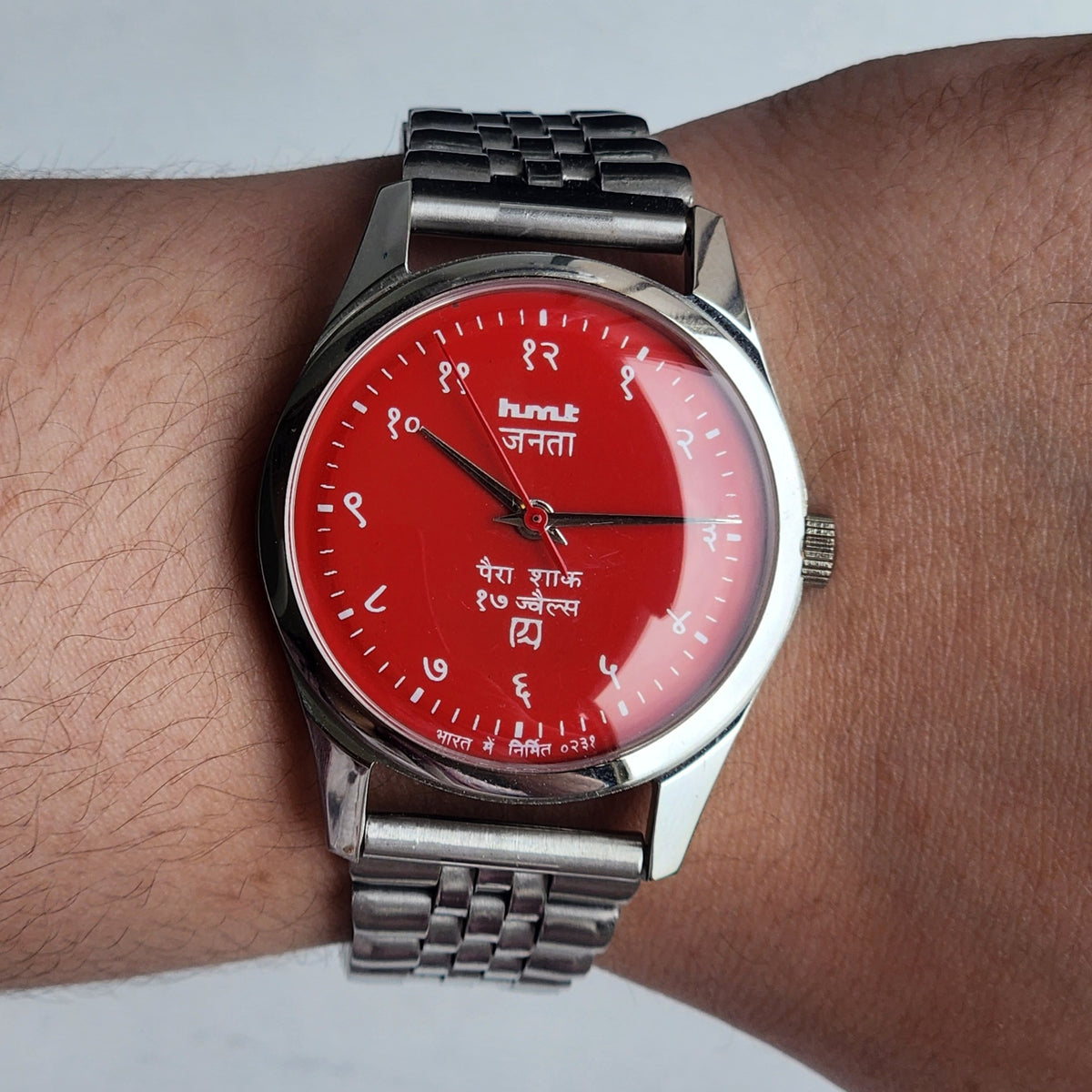 Vintage MOD HMT Janata Devanagari Hand Winding 17 Jewels Red Face 35MM Silver Case Exhibition Back Men's Wrist Watch G48