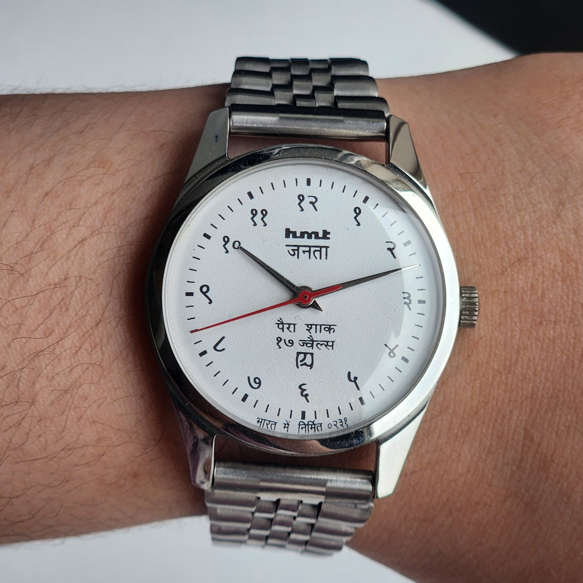 Vintage MOD HMT Janata Devanagari Hand Winding 17 Jewels White Face 35MM Silver Case Exhibition Back Men's Wrist Watch G49