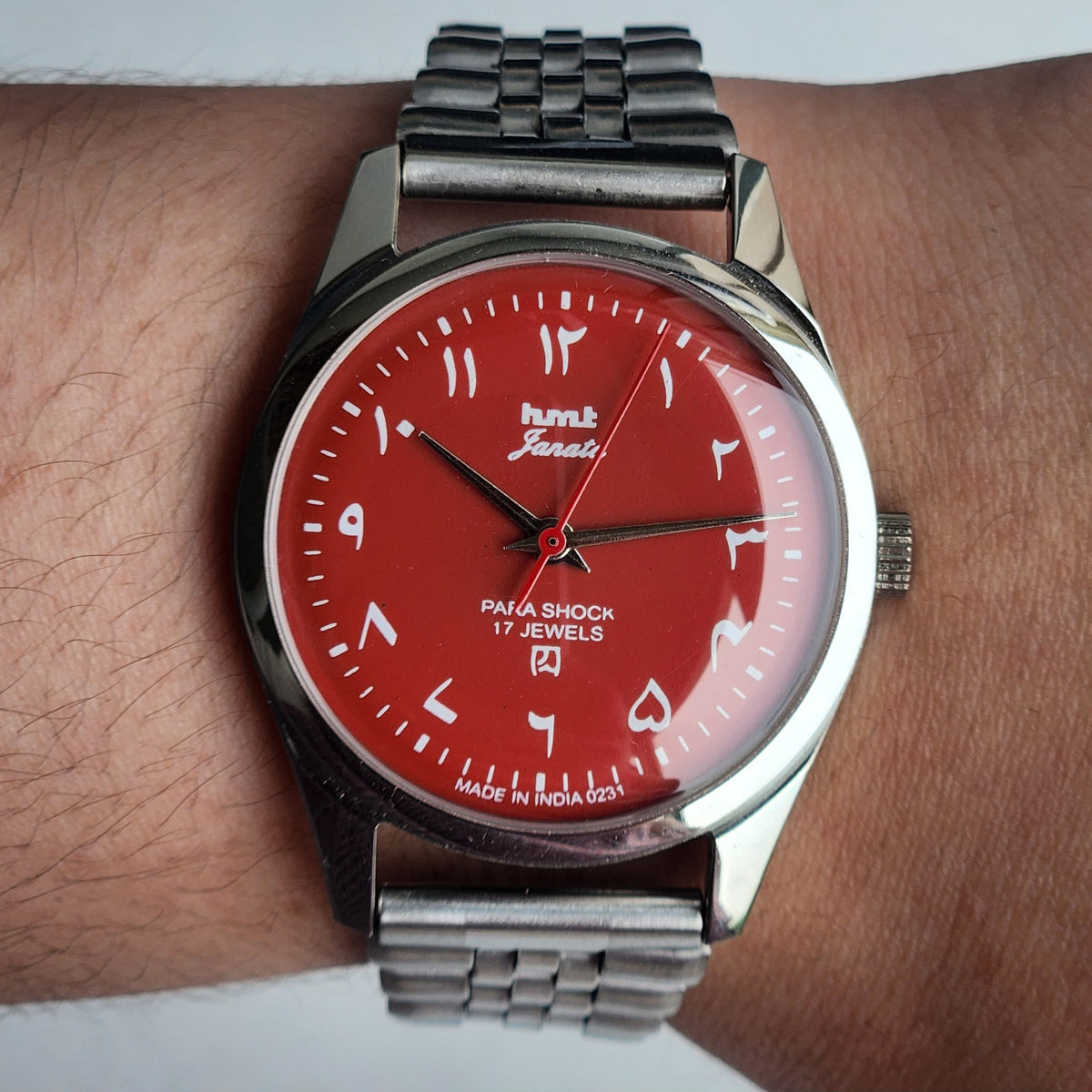 Vintage MOD HMT Janata Urdu/Arabic Hand Winding 17 Jewels Red Face 35MM Silver Case Exhibition Back Men's Wrist Watch G51