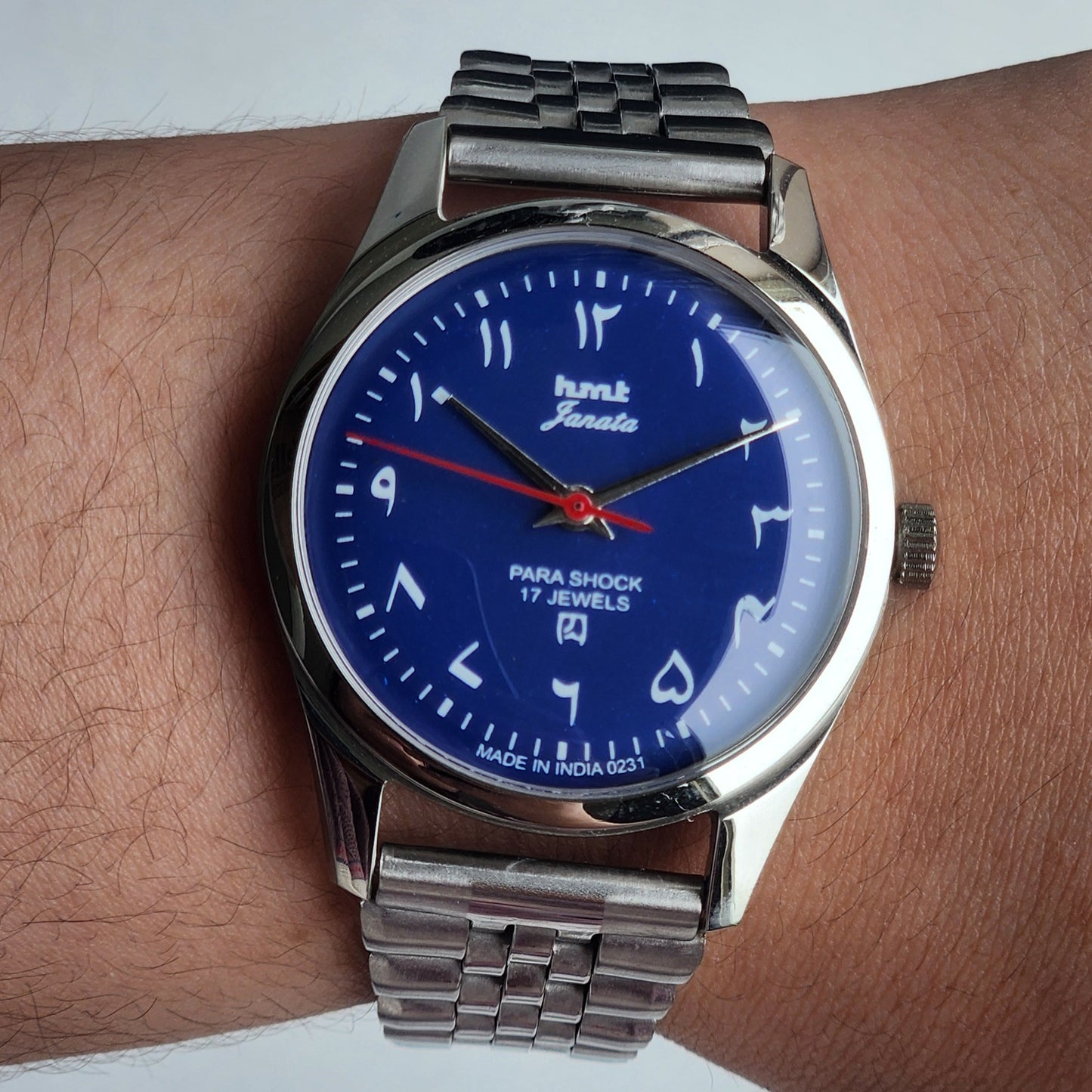 Vintage HMT Janata Urdu/Arabic Hand Winding 17 Jewels Blue Face 35MM Silver Case Exhibition Back Men's Wrist Watch G52