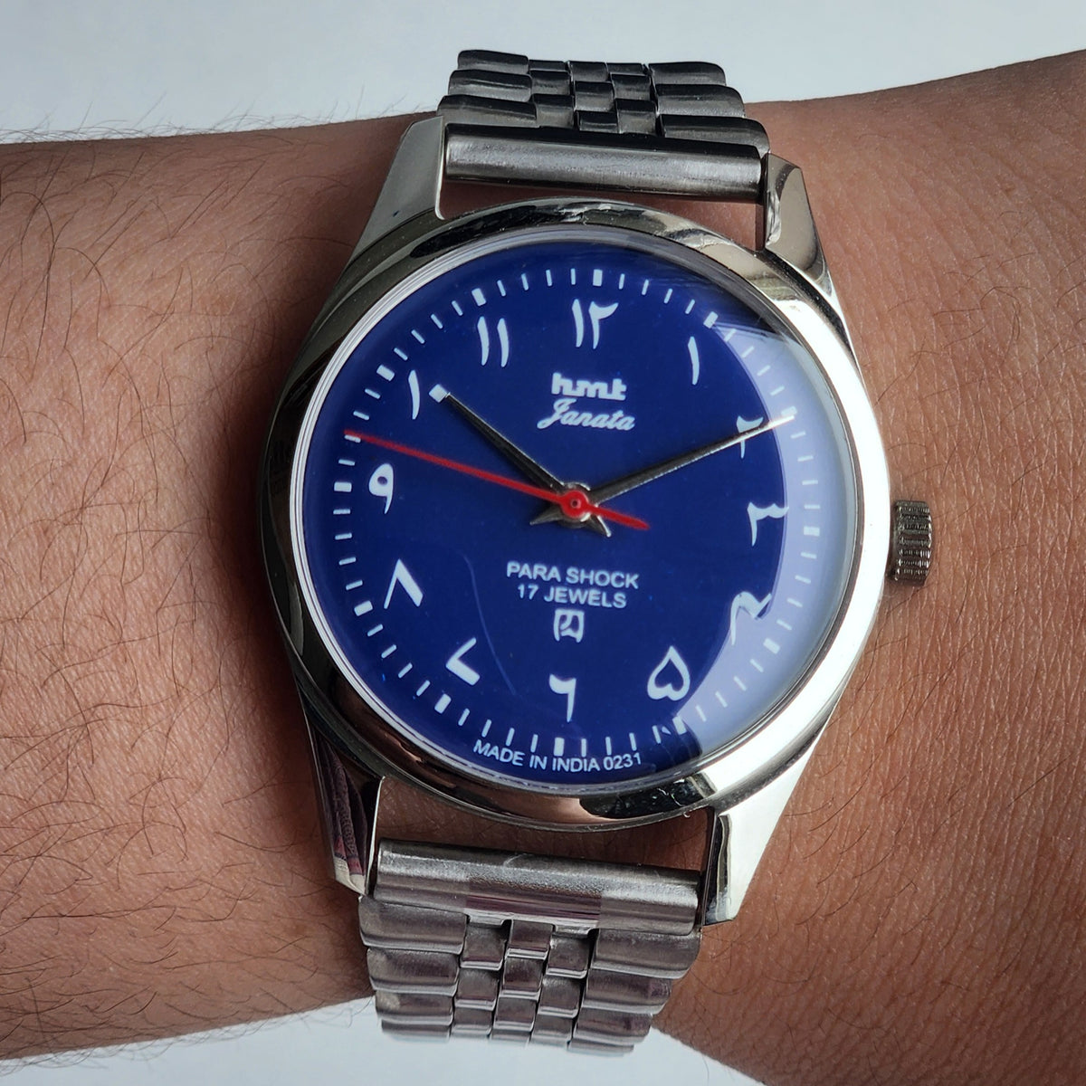 Vintage MOD HMT Janata Urdu/Arabic Hand Winding 17 Jewels Blue Face 35MM Silver Case Exhibition Back Men's Wrist Watch G052