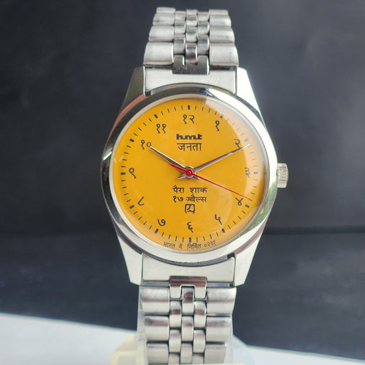 Vintage HMT Janata Devanagari Hand Winding 17 Jewels Yellow Face 35MM Silver Case Exhibition Back Men's Wrist Watch G55