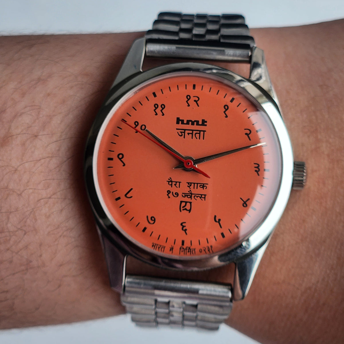 Vintage MOD HMT Janata Devanagari Hand Winding 17 Jewels Peach Face 35MM Silver Case Exhibition Back Men's Wrist Watch G056