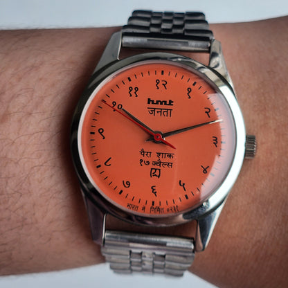 Vintage HMT Janata Devanagari Hand Winding 17 Jewels Peach Face 35MM Silver Case Exhibition Back Men's Wrist Watch G56