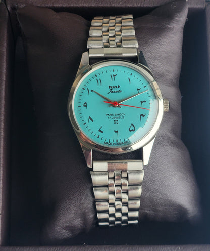 Vintage HMT Janata Urdu/Arabic Hand Winding 17 Jewels Sky Blue 35MM Silver Case Exhibition Back Men's Wrist Watch G58