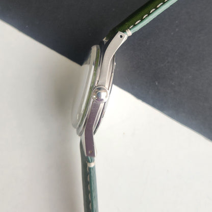 Vintage HMT Janata Devanagari Hand Winding 17 Jewels Green Face 35mm Silver Case Green Leather Strap Men's Wrist Watch G82