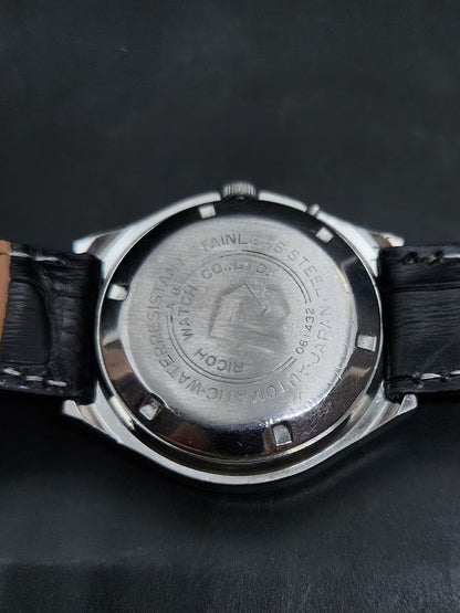 Vintage Ricoh R31 Automatic Black Face New Strap 21 Jewels Day-Date Men's Wrist Watch AS33