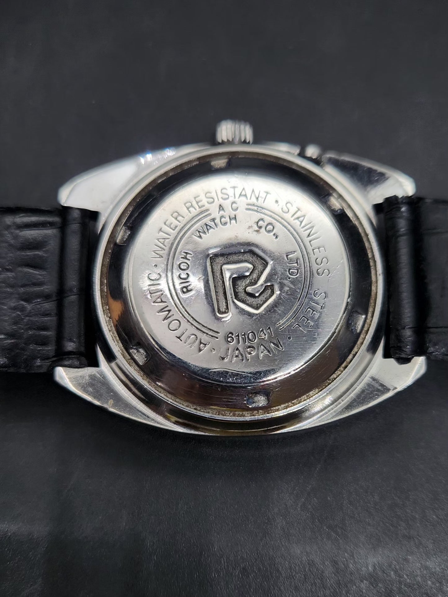 Vintage Ricoh R31 Automatic Black Face New Strap 21 Jewels Day-Date Men's Wrist Watch AS38