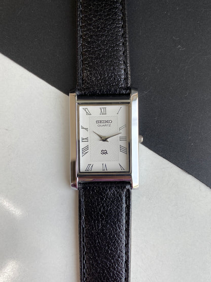 Seiko Slim Rectangular Quartz White Face Black Band Men's Wrist Watch F02