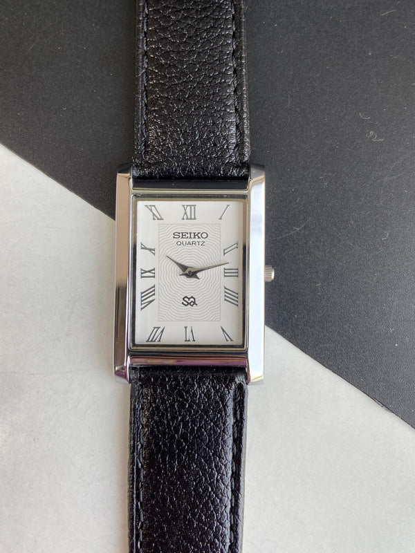 Seiko Slim Rectangular Quartz White Face Black Band Men's Wrist Watch ...