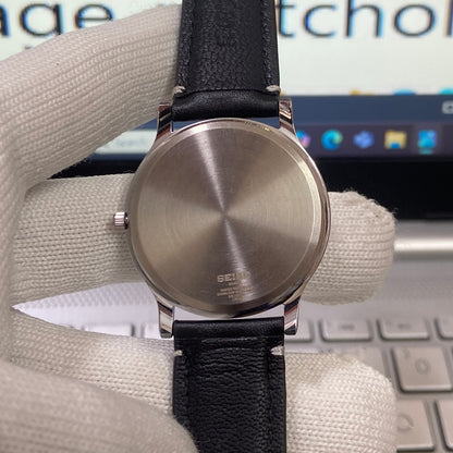 Vintage Seiko Slim Quartz Black Face Black Band Men's Wrist Watch C12