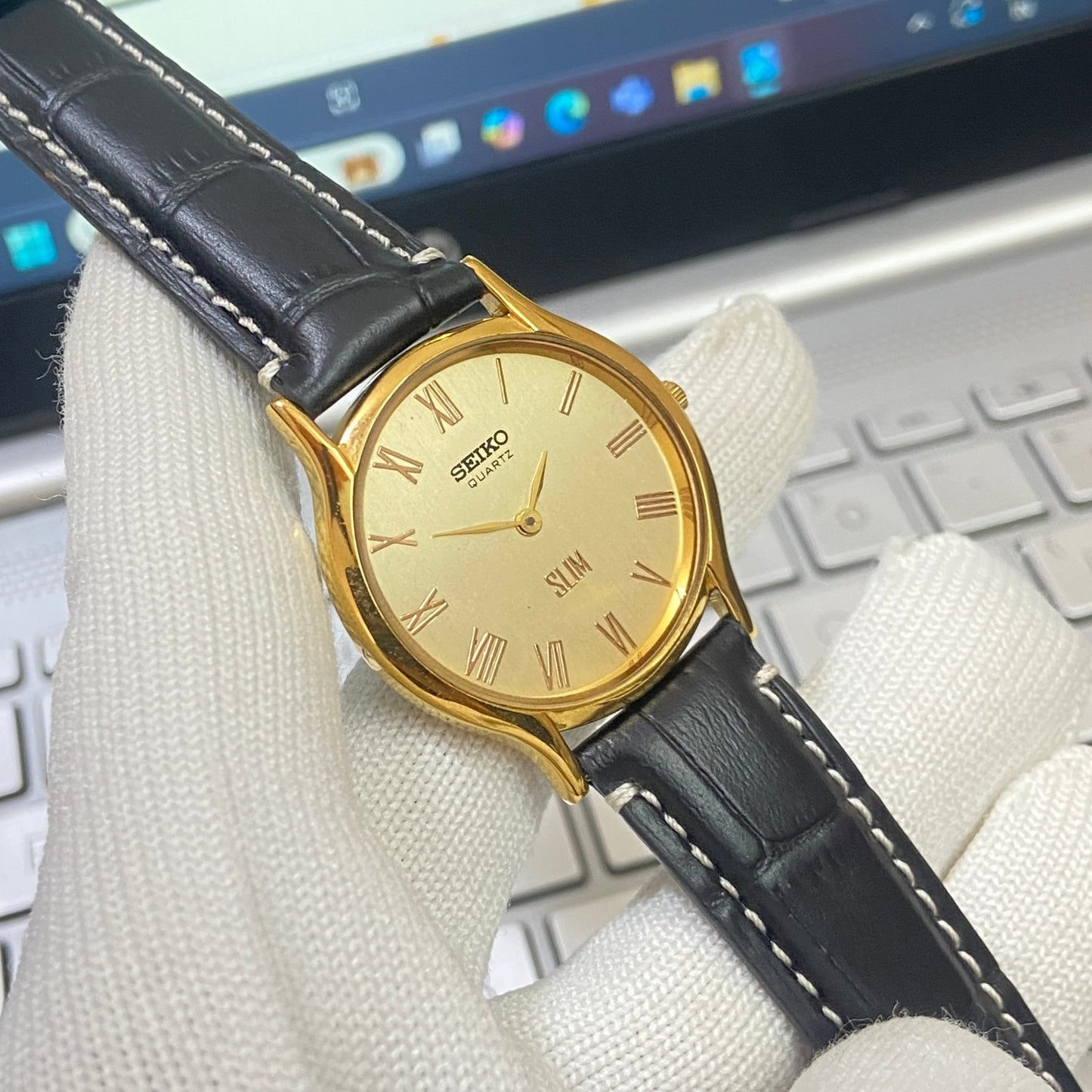 Vintage Seiko Slim Quartz Golden Face Black Band Men's Wrist Watch C14