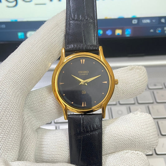 Vintage Seiko Slim Quartz Black Face Black Band Men's Wrist Watch C15