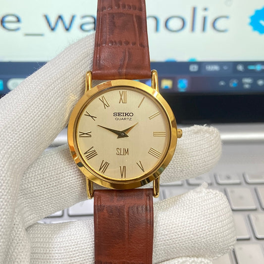 Vintage Seiko Slim Quartz Golden Face Brown Band Men's Wrist Watch C16