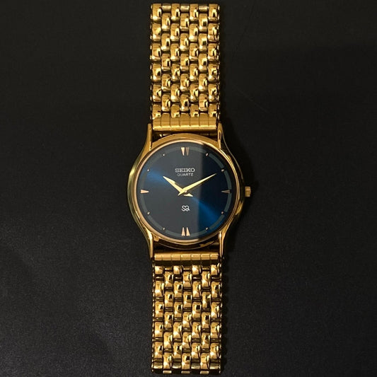 Vintage Seiko Slim Quartz Blue Face Golden Looser Chain Not Adjustable Men's Wrist Watch C19