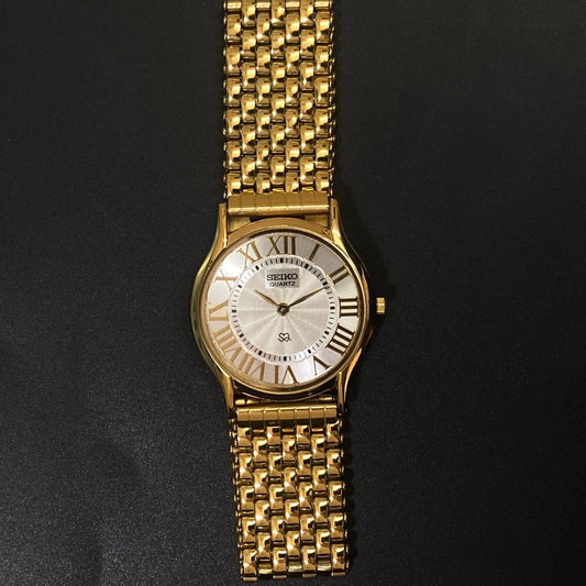 Vintage Seiko Slim Quartz Silver Face Golden Looser Chain Not Adjustable Men's Wrist Watch C21