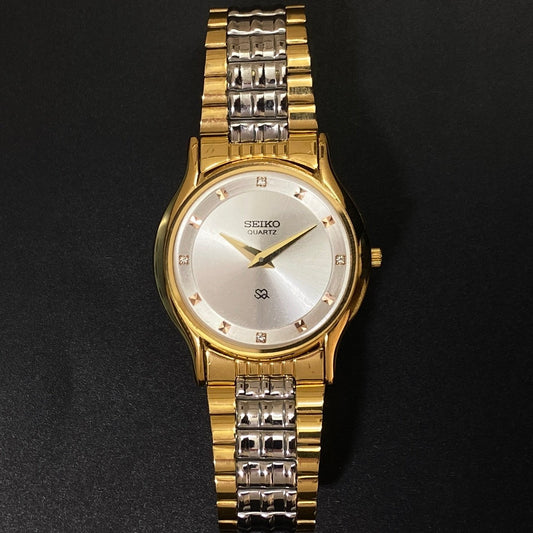 Vintage Seiko Slim Quartz Silver Face Two Tone Men's Wrist Watch C24