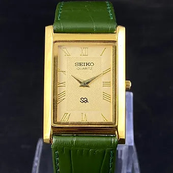 Seiko Slim Rectangular Quartz Golden Face Green Band Men's Wrist watch C50