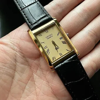 Seiko Slim Rectangular Quartz Golden Face Black Band Men's Wrist watch C54