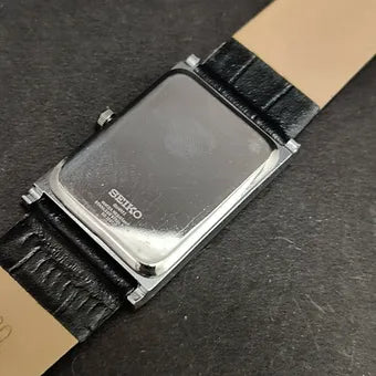 Seiko Slim Rectangular Quartz Black Face Black Band Men's Wrist Watch C77