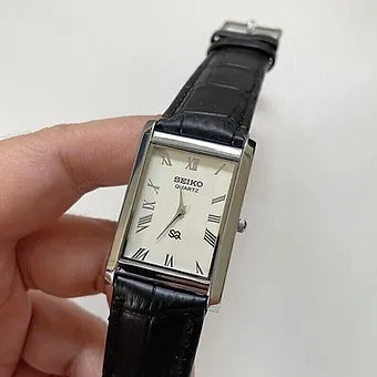 Seiko Slim Rectangular Quartz White Face Black Band Men's Wrist Watch C81