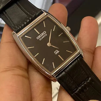 Seiko Slim Barrel Quartz Black Face Black Band Men's Wrist Watch C82