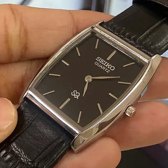 Seiko Slim Barrel Quartz Black Face Black Band Men's Wrist Watch C82