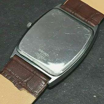 Seiko Slim Barrel Quartz Black Face Brown Band Men's Wrist Watch C83