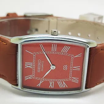 Seiko Slim Barrel Quartz Red Face Brown Band Men's Wrist Watch C84