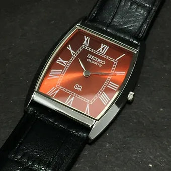Seiko Slim Barrel Quartz Red Face Black Band Men's Wrist Watch C85