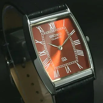 Seiko Slim Barrel Quartz Red Face Black Band Men's Wrist Watch C85