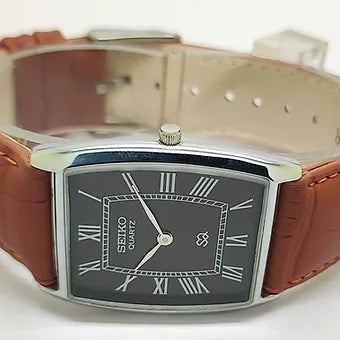 Seiko Slim Barrel Quartz Black Face Brown Band Men's Wrist Watch C86