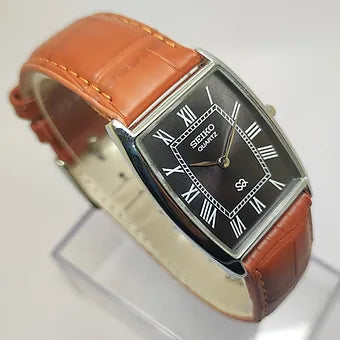 Seiko Slim Barrel Quartz Black Face Brown Band Men's Wrist Watch C86