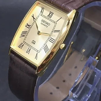 Seiko Slim Barrel Quartz Golden Face Brown Band Men's Wrist Watch C95