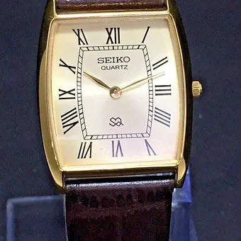 Seiko Slim Barrel Quartz Golden Face Brown Band Men's Wrist Watch C95