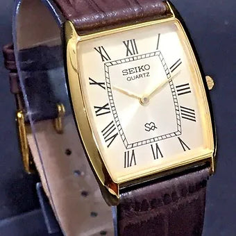 Seiko Slim Barrel Quartz Golden Face Brown Band Men's Wrist Watch C95
