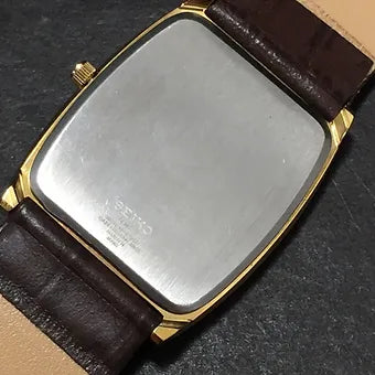 Seiko Slim Barrel Quartz Golden Face Brown Band Men's Wrist Watch C95